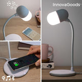 led white lamp with wireless speaker charger in the office